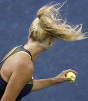 Caroline Wozniacki Denmark Gets Serve Wind Dominika Cibulkova Slovakia During U.S. Open Tennis Tournament York September 2010. REUTERS/Kevin Lamarque (UNITED STATES Tags: SPORT TENNIS)