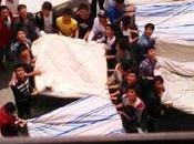 Chinese Students Attempt Save Female from Jumping Death Bedsheets