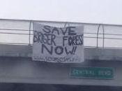 Protesters Drop Banner Demanding Briger Forest Saved